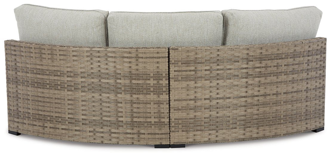 Calworth Outdoor Curved Loveseat with Cushion